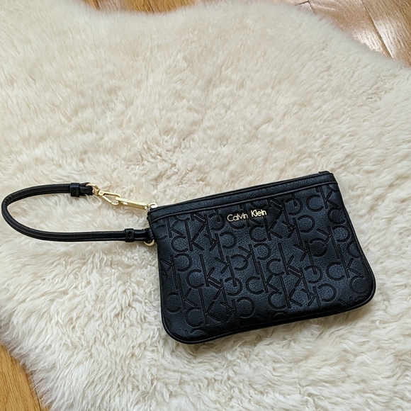Calvin Klein Handbags - Calvin Klein black pouch